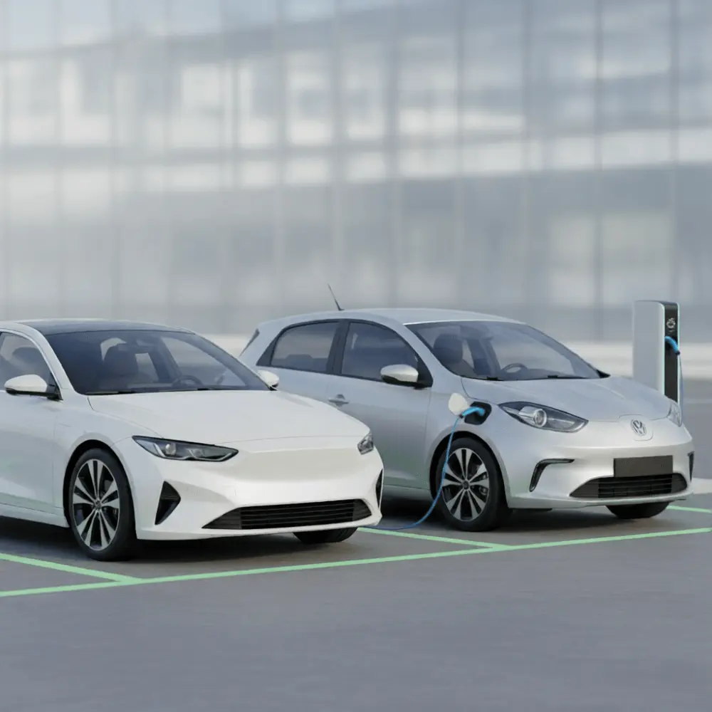 Used hybrid car and used EV parked at a charging station, representing fuel-efficient picks for 2026